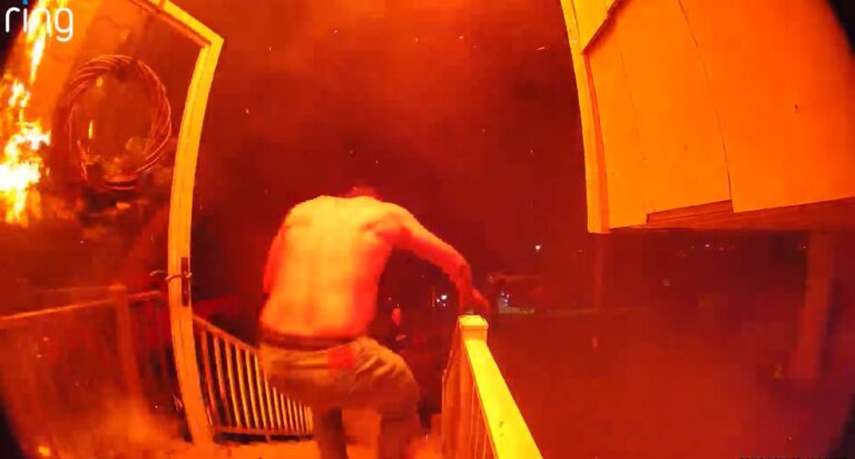 Caught on camera: neighbor saves toms river family from burning house - photo licensed by shore news network.