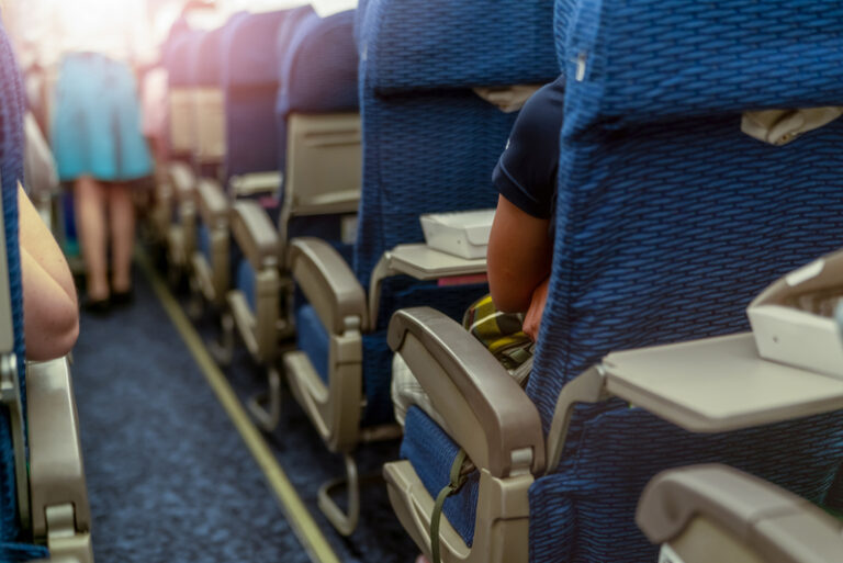 Inside airline cabin.