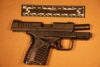 Liquor shop owner arrested after cops find cocaine and loaded pistols