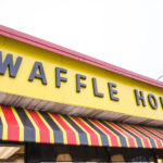 Bright yellow Waffle House sign