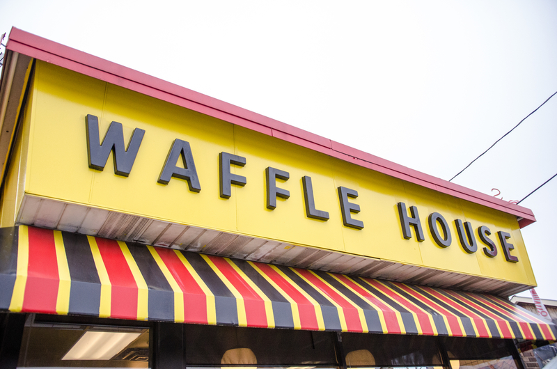 Bright yellow Waffle House sign