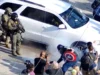 Watch: cosplaying superhero arrested by ice in unhinged attack on agents