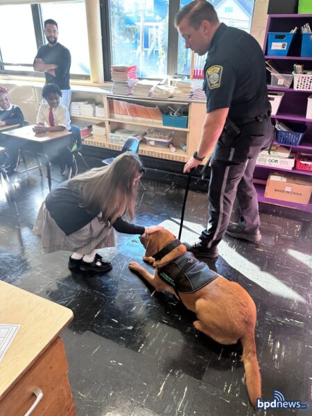 Boston officers share stories and smiles with Roslindale students