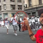 Chris Pollak - Marching in the NYC Pride Parade with a shirt some say could say "Defund the Police"