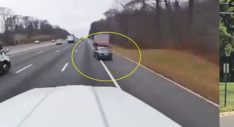 Video shows reckless driver swerving through traffic on i-80 in near-fatal close call - photo licensed by shore news network.