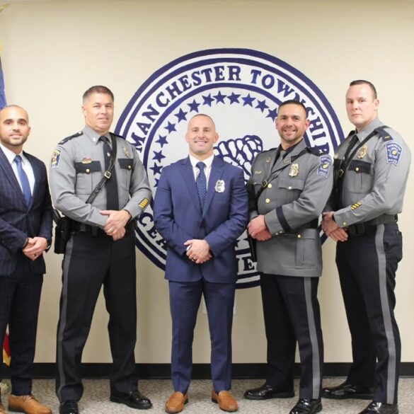 New hire takes oath as manchester brings on veteran officer - photo licensed by shore news network.