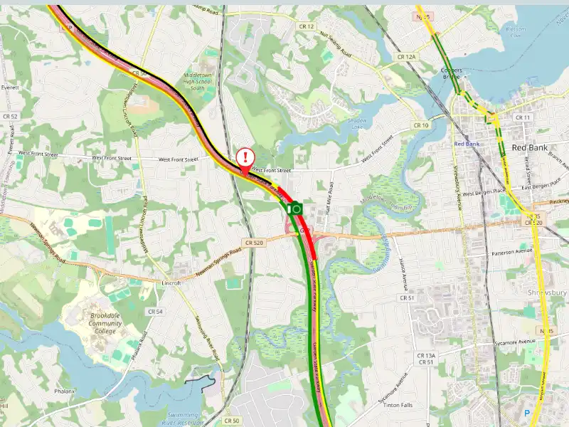 Overturned vehicle shuts down garden state parkway express lanes in middletown - photo licensed by shore news network.