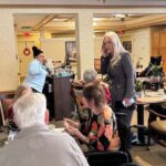 Mayor kuhn visits senior holiday party at sunrise senior living holiday food drive - photo licensed by shore news network.