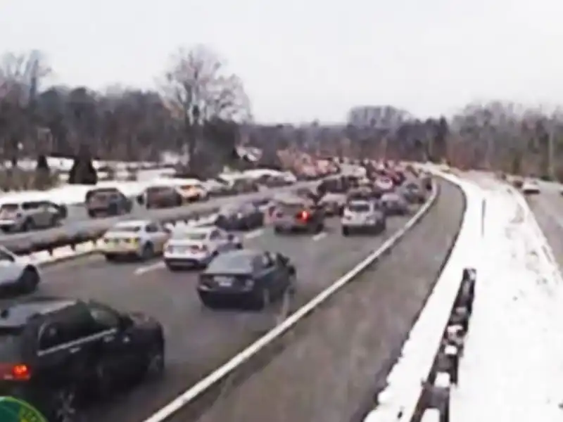 Overturned vehicle shuts down garden state parkway express lanes in middletown - photo licensed by shore news network.