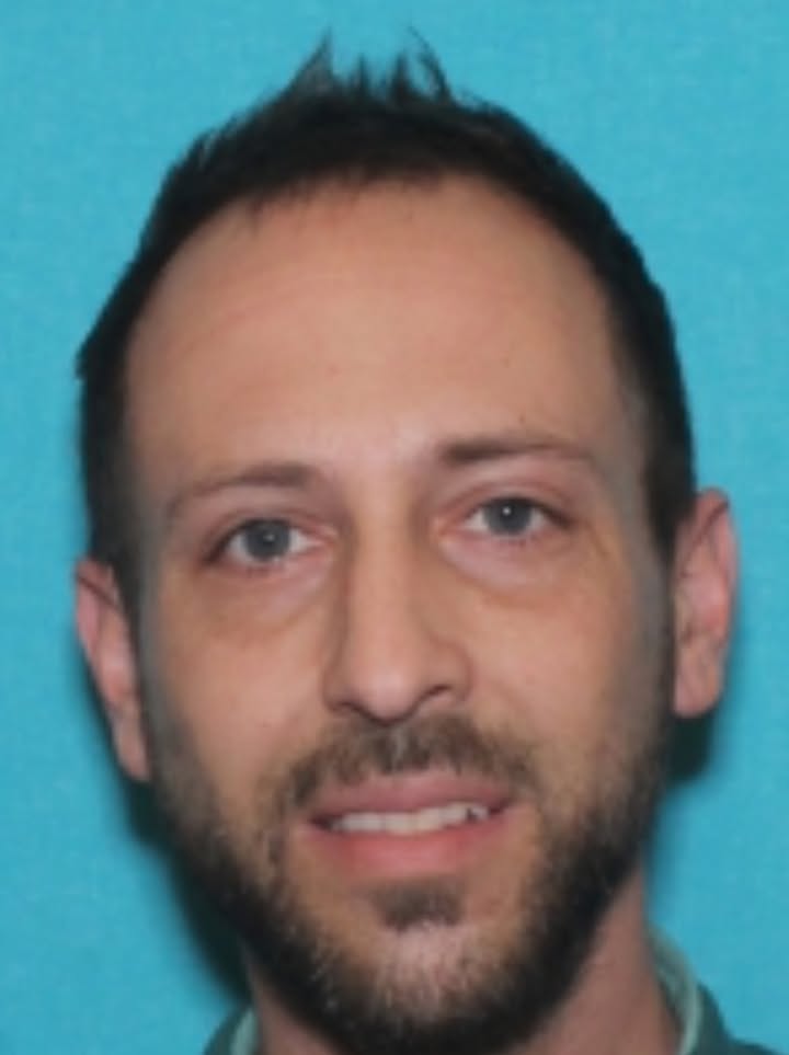 Dangerous wanted suspect in stolen vehicle chase crashes; captured by police - photo licensed by shore news network.