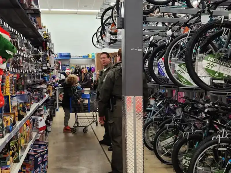 Akron officers join area departments to give kids a $200 holiday shopping spree - photo licensed by shore news network.