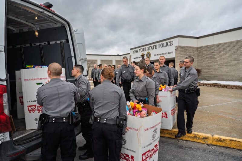 State police recruits deliver holiday cheer with toys for tots drive at academy