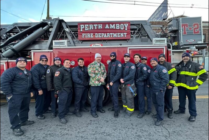 Perth amboy firefighters join city parade, remind residents to stay safe this holiday season - photo licensed by shore news network.