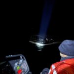 Coast guard rescues three after 74-foot vessel breaks apart off manasquan inlet - photo licensed by shore news network.