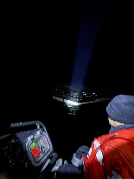 Coast guard rescues three after 74-foot vessel breaks apart off manasquan inlet - photo licensed by shore news network.