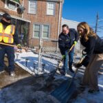Mikie sherrill "shovels snow" on mlk day in camden - photo licensed by shore news network.