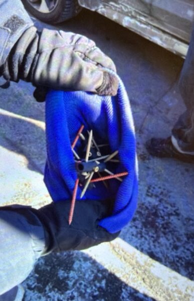Protester arrested for using caltrops to disable police vehicles during riots