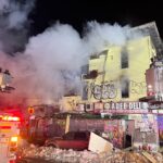 Bronx building swallowed by flames in multi-alarm fire - photo licensed by shore news network.