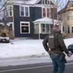 T-rex crushing a car at scene of deadly minnesota ice shooting goes unnoticed - photo licensed by shore news network.