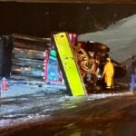 Vdot plow truck overturns on van dorn street during storm cleanup - photo licensed by shore news network.