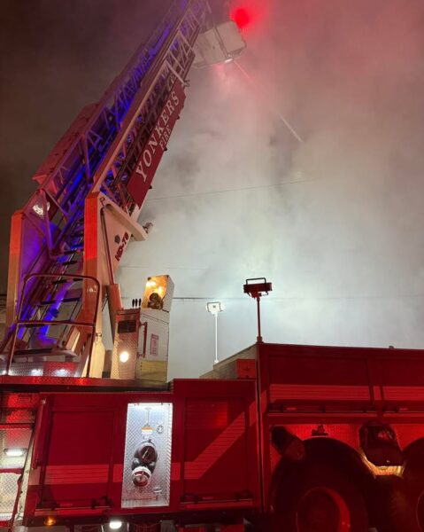 Four-alarm fire tears through school street building in overnight yonkers blaze - photo licensed by shore news network.