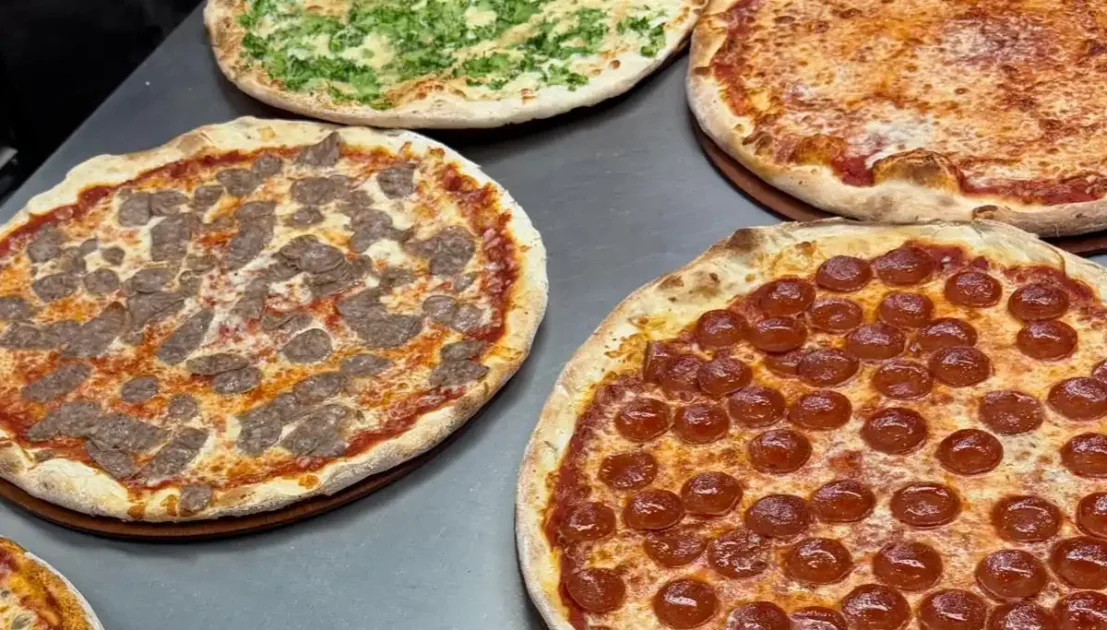 Crowds pack wildwood boardwalk as sam’s pizza kicks off 70th season - photo licensed by shore news network.