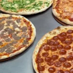 Crowds pack wildwood boardwalk as sam’s pizza kicks off 70th season - photo licensed by shore news network.