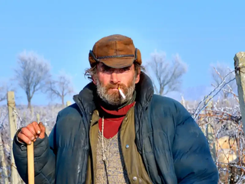 Man smoking in a field