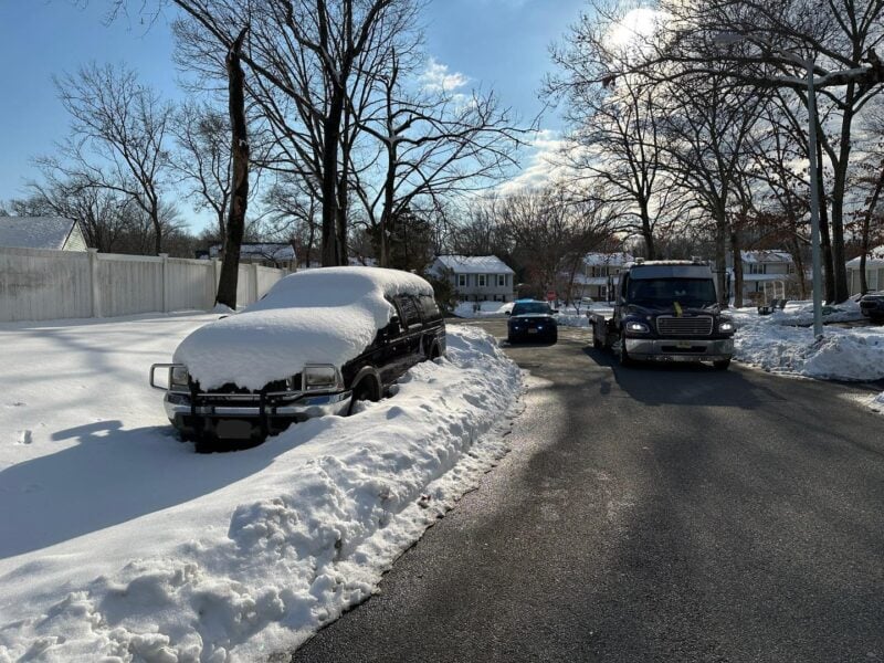 Manchester police tow cars after owners ignored snow storm street parking warnings