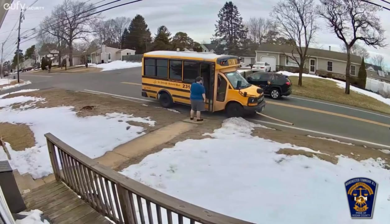 SUV driver blows past school bus in Manchester