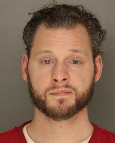 Fugitive busted hiding under table in Allegheny County home Fugitive busted hiding under table in Allegheny County home