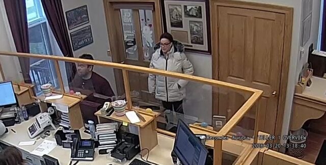 Woman wanted after stealing purse and withdrawing thousands from banks