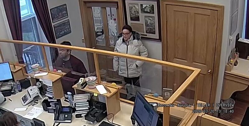 Woman wanted after stealing purse and withdrawing thousands from banks