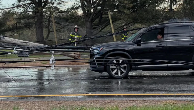 Crash with downed power lines traps drivers on route 34 in wall township, crews rescue occupants