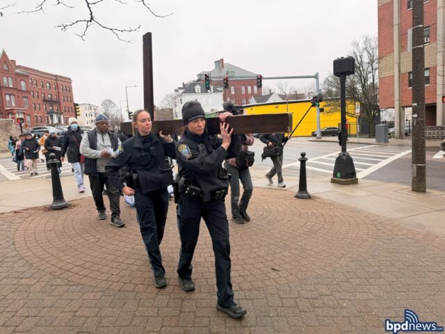 Boston police join good friday walk honoring victims of violence in dorchester