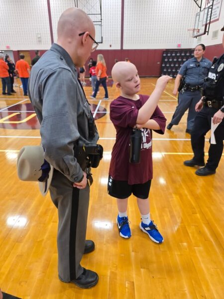 Troopers join special olympics basketball competition in central square, celebrating athletes and community Troopers join special olympics basketball competition in central square, celebrating athletes and community