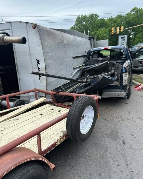 Garbage truck overturns on route 70 in manchester, slams into waiting pickup near landfill Garbage truck overturns on route 70 in manchester, slams into waiting pickup near landfill
