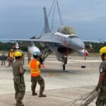 Air national guard recovery team to raise f-16 during operation in cape may | photo licensed by shore news network. Air national guard recovery team to raise f-16 during operation in cape may