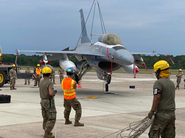 Air national guard recovery team to raise f-16 during operation in cape may