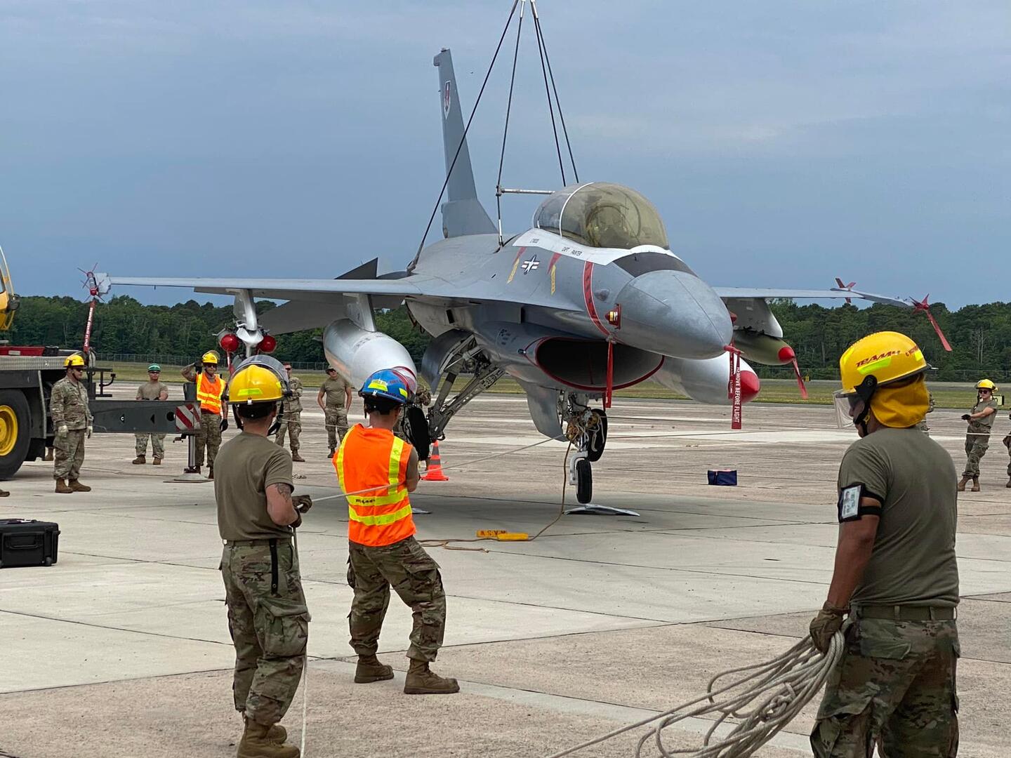 Air national guard recovery team to raise f-16 during operation in cape may