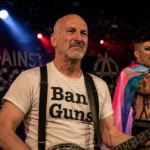 Satirical recreation of tom nivison, banjo played in transgendered bluegrass band.