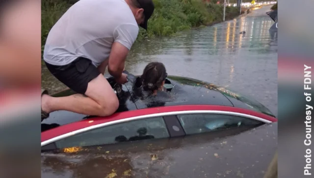 Off-duty fdny firefighter rescues woman from submerged car during queens flash flooding