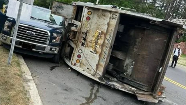 Garbage truck overturns on route 70 in manchester, slams into waiting pickup near landfill