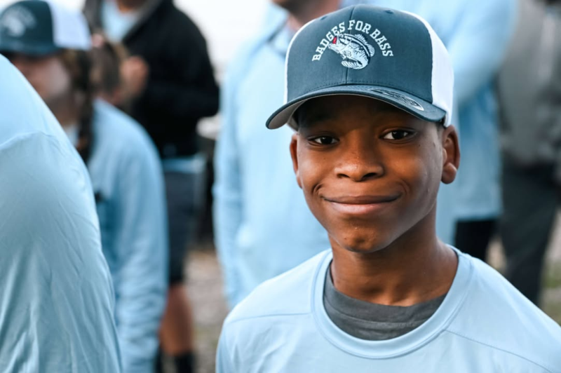 Cops and kids hit the water as baltimore county's badges for bass reels in community bonds