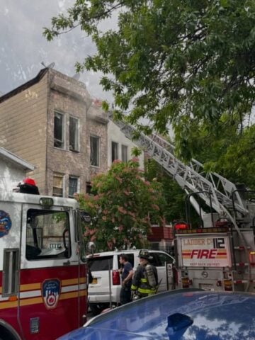 Fdny stops brooklyn rowhouse fire from spreading down weirfield street block | photo licensed by shore news network. Fdny stops brooklyn rowhouse fire from spreading down weirfield street block