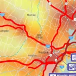 Map of the Newark, NJ area showing heavy traffic with red congestion lines along major highways (I-280, I-95) and surrounding streets; labeled towns (Newark, East Orange, Secaucus) and venue icons on the right.