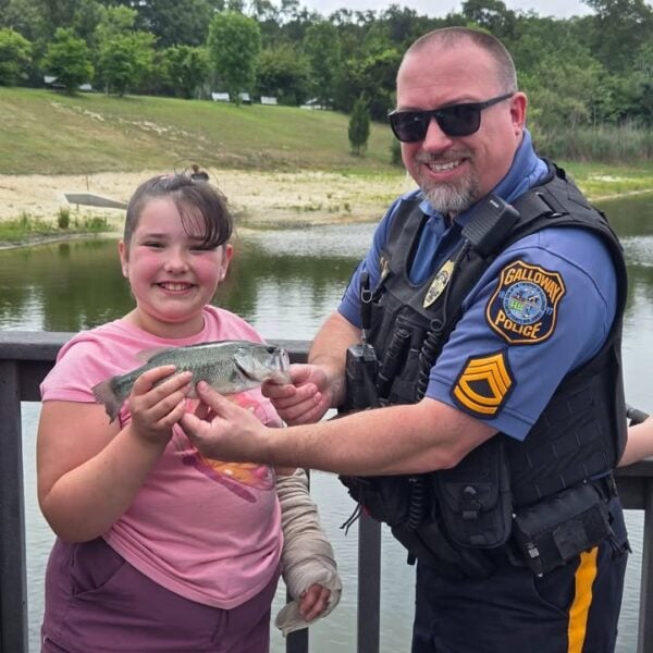 Galloway police reel in families for annual cops n' bobbers fishing derby Galloway police reel in families for annual cops n' bobbers fishing derby