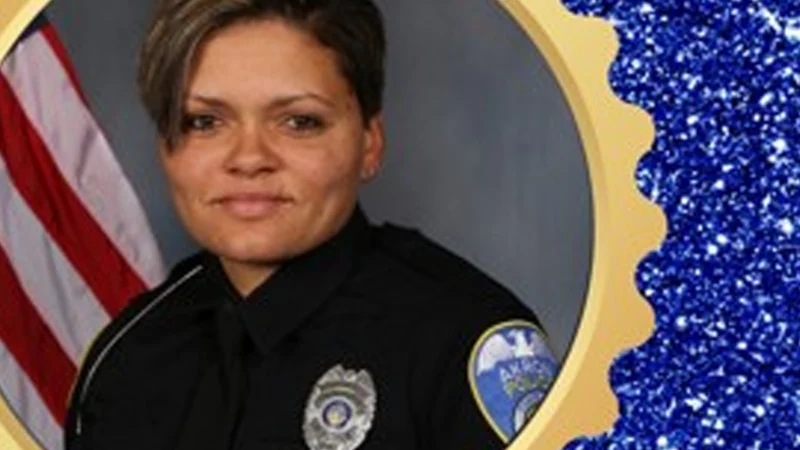 Akron officer honored after saving choking worker with heimlich maneuver