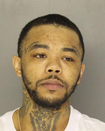Fugitive found hiding beneath attic insulation as deputies uncover stolen gun and drugs Fugitive found hiding beneath attic insulation as deputies uncover stolen gun and drugs