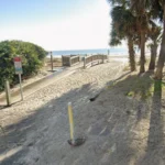 Emergency crews recovered the body of a swimmer who disappeared after rescuing a young girl from a rip current off Myrtle Beach.